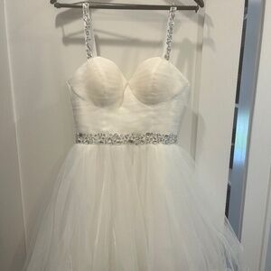 White, sparkly straps and waist, Size 2, never been worn